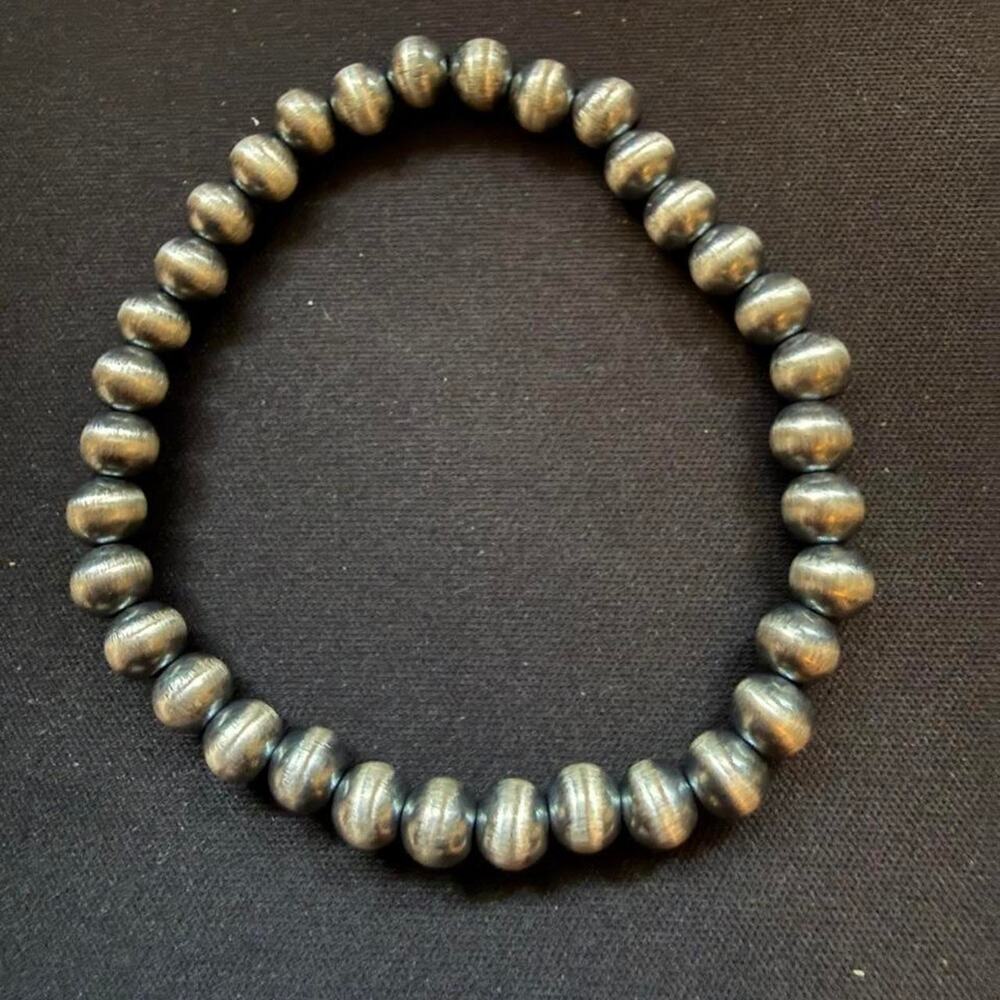 Native hand strung 6mm oxidized pearl bracelet